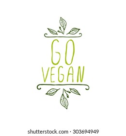 Hand-sketched typographic element. Go vegan - product label on white background. Suitable for ads, signboards, packaging and identity and web designs.