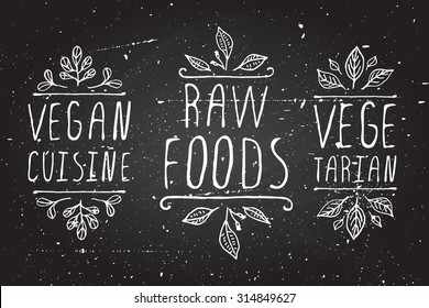 Hand-sketched typographic elements. Healthy food product labels on chalkboard background. Vegan cuisine. Raw foods. Vegetarian