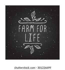 Hand-sketched typographic elements on chalkboard background. Farm for life