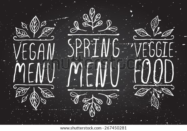 Hand-sketched typographic\
elements on chalkboard background. Vegan menu. Spring menu. Veggie\
food. Restaurant labels. Suitable for ads, signboards, menu and web\
banner designs