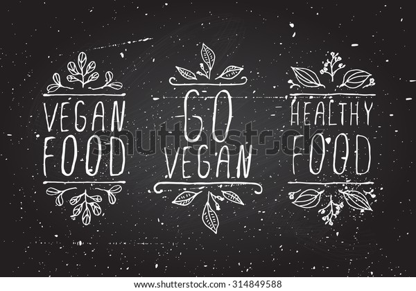 Hand-sketched typographic elements. Vegan product\
labels on chalkboard background. Vegan food, go vegan, healthy\
food