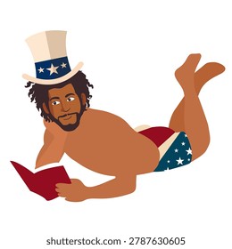 handsome american man lying down reading book wearing hat