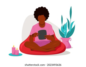 Handsome black man sitting and reading an e-book. Vector concept illustration of reading, recreation. Online library.