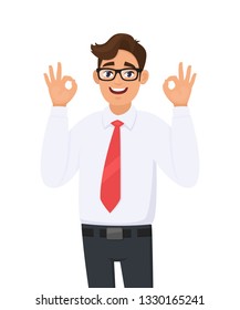 Handsome cheerful young business man showing/gesturing/making okay or ok sign with two hands and fingers. Human emotions, facial expressions, feelings concept illustration in vector cartoon style.