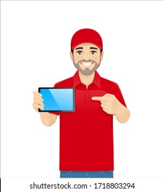 Handsome delivery man in red uniform showing tablet witn blank screen. Isolated vector illustration