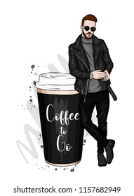 Buen tipo con ropa elegante. Hipster. Ilustración vectorial. Un gran vaso de café.