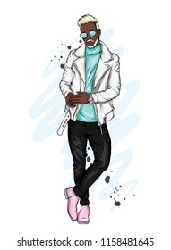 Handsome guy in stylish clothes. Hipster. Vector illustration.