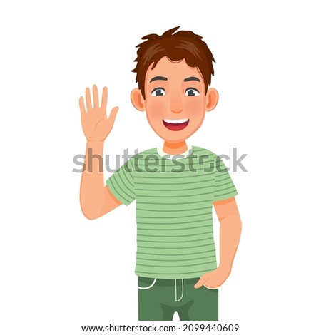 Handsome happy young man with hand in the pocket, smiling, waving hand cheerfully saying hi, hello nice to meet you, welcoming people with informal greeting gesture