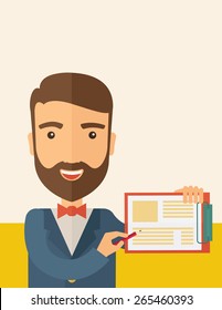 A handsome hipster Caucasian man wearing blue jacket holding his clipboard with paper where he wrote his report happily presenting his marketing plan. Marketing strategy concept. A contemporary style