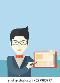 A handsome hipster Caucasian man wearing blue jacket holding his clipboard with paper where he wrote his report happily presenting his marketing plan. Marketing strategy concept. A contemporary style