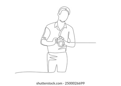 Handsome male photographer. World photography day concept one-line drawing