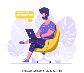Handsome man is chatting with a laptop. A man is sitting on a yellow armchair and working at his laptop. Working process flat design. Vector Illustration