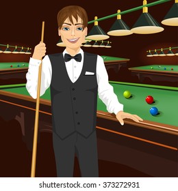 handsome man holding cue stick