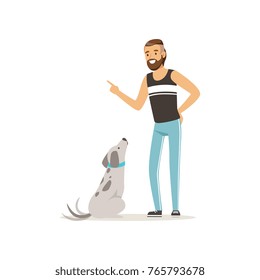 Handsome man teaching his dog to sit. Bearded guy character in sport pants and t-shirt. Human s best friends. Domestic animal. Flat design vector