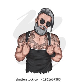 Handsome muscular guy with stylish hair, beard and tattoos. Hipster. Fashion and style, clothing and accessories.