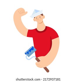 Handsome young guy painter with a roller stained with blue paint on a white background