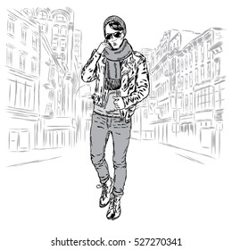 Handsome young man in a leather jacket, hat and scarf. Vector illustration for a card or poster, print on clothes. Fashion & Style.