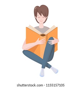 A handsome young man is reading a big book. Isolated on white background.