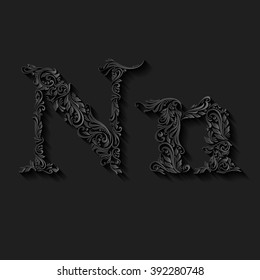 Handsomely decorated letter n in upper and lower case on black