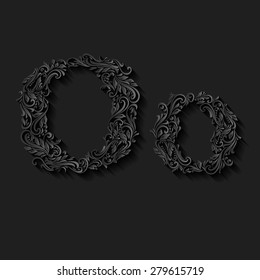 Handsomely decorated letter o in upper and lower case on black
