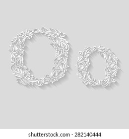 Handsomely decorated letter O in upper and lower case on gray