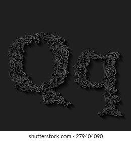 Handsomely decorated letter q in upper and lower case on black