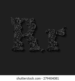 Handsomely decorated letter r in upper and lower case on black