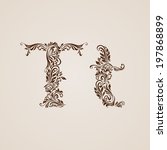 Handsomely decorated letter t in upper and lower case.