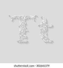 Handsomely decorated letter T in upper and lower case on gray