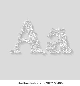 Handsomely decorated letter A in upper and lower case on gray