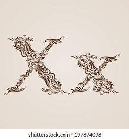 Handsomely decorated letter x in upper and lower case.
