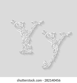 Handsomely decorated letter Y in upper and lower case on gray