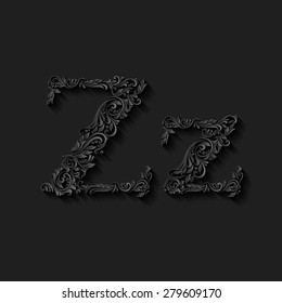 Handsomely decorated letter z in upper and lower case on black