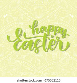 Handwriting lettering Happy Easter. The phrase in green on a white green background.