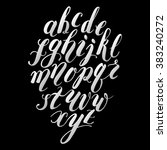 Handwritten alphabet white chalk letters on black background. Modern calligraphy lettering.