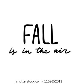 Handwritten autumn season inscription. Vector hand lettering Fall is in the air. Modern brush calligraphy isolated on white background.