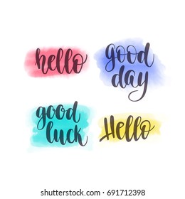 Handwritten brush calligraphy catchwords. Hello, Good day, Good luck. Vector hand lettering and watercolor spot background for poster, card or for web banners, blog design or social media contests.