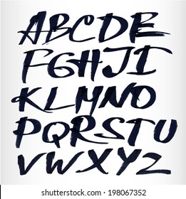 Handwritten calligraphic black watercolor alphabet