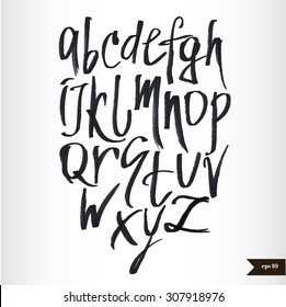 Handwritten calligraphic black watercolor alphabet