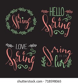 Handwritten calligraphic Spring lettering set on black background. Inspiration decorative graphic design element for banner, greeting card, postcard, invitation, poster. Vector illustration.