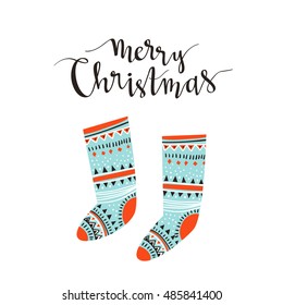 Hand-written Christmas lettering and christmas socks for gifts isolated on white background.  Season vector holiday  design with calligraphy - Merry Christmas.