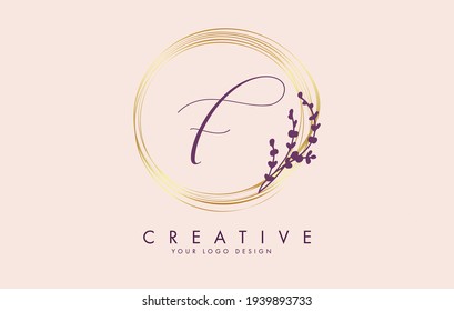 Handwritten F Letter logo design with golden circles and white leaves on branches. Vector Illustration with F letter for personal branding, corporate, business, eco friendly or natural products. 