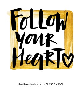 Handwritten "Follow your heart" motivation poster with modern calligraphy in hand painted golden frame