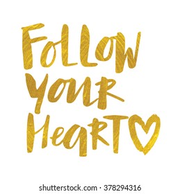 Handwritten "Follow your heart" motivation poster. Modern calligraphy with golden acrylic texture