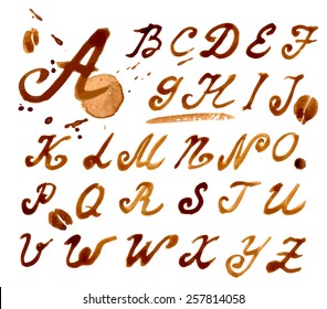 Handwritten font with elements drawn coffee splashes and stains. Vector illustration.