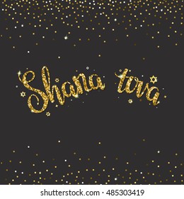 Handwritten glitter gold  lettering with text "Shana tova". Design elements for Rosh Hashanah (Jewish New Year).