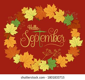 Handwritten, hello september, lettering message. Autumn welcome quote with color leaves background. Modern lettering. Hello September design for cards, banners, posters.