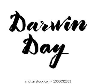 Handwritten lettering "Darwin Day" in English with black ink