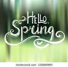 Handwritten Lettering Hello, Spring with decoration on green blurred background. Defocused Nature. Vector element for cards, banner and your design