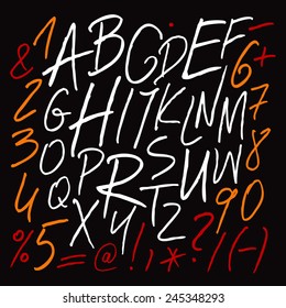 Handwritten letters on black background. Vector alphabet written with a pen. 